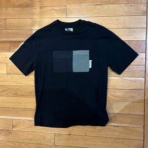 Letasca t shirt. Front Velcro pockets. Size medium. Black t shirt